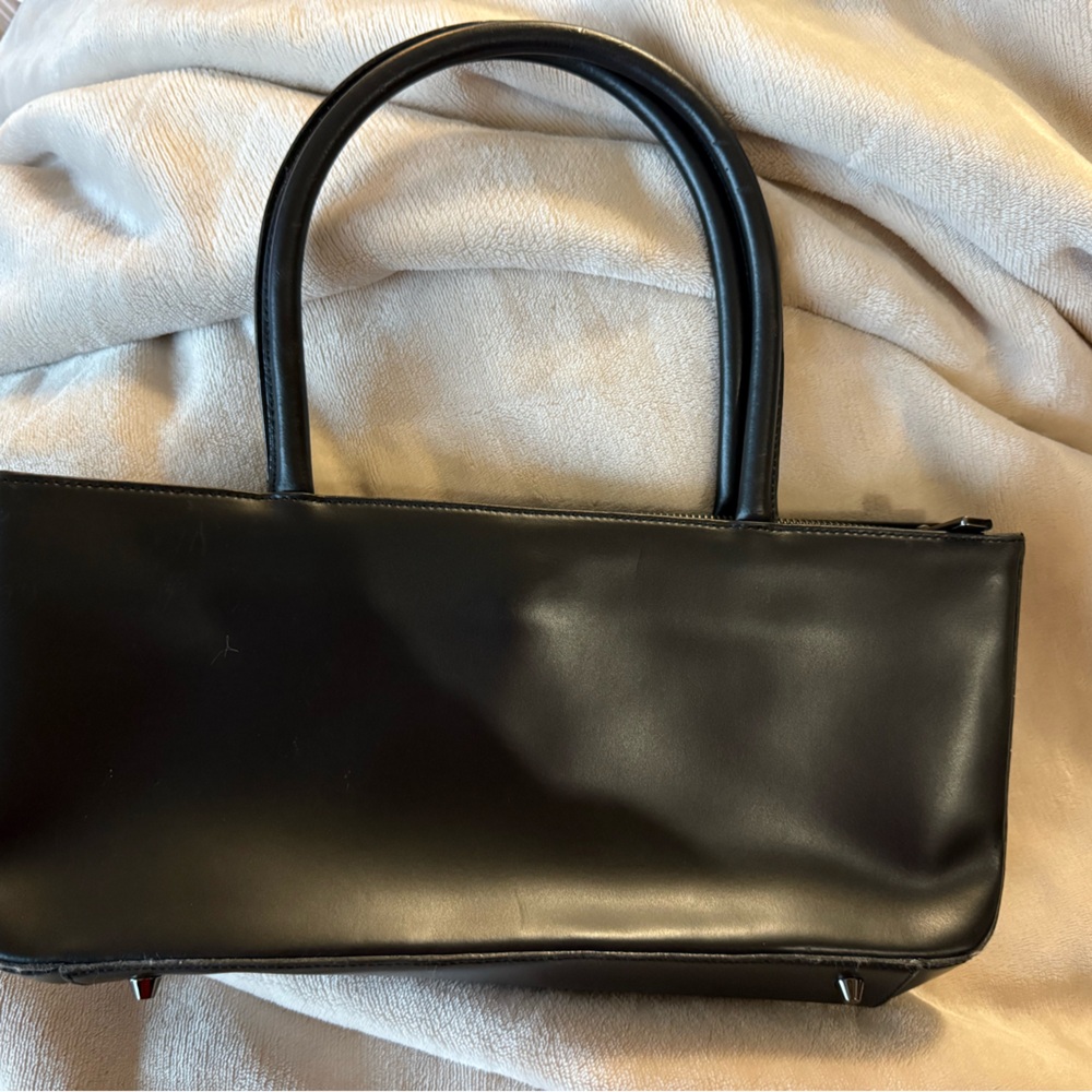 Simplistic yet elegant Black Furla Handbag